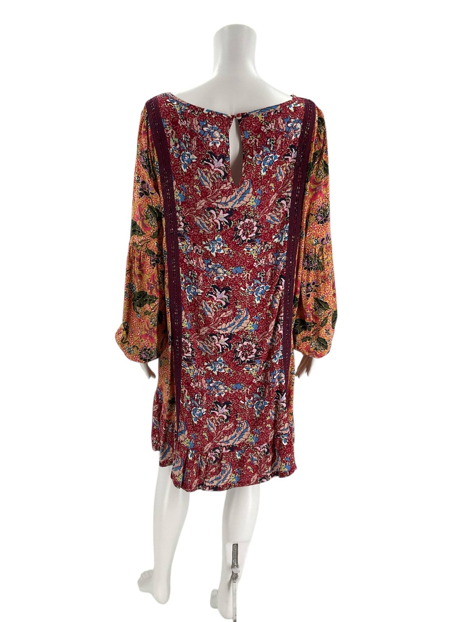 Back view of Matilda Jane boat neck mini dress in maroon floral print, size medium, with keyhole detail. Available at Margaret’s Fine Consignments.