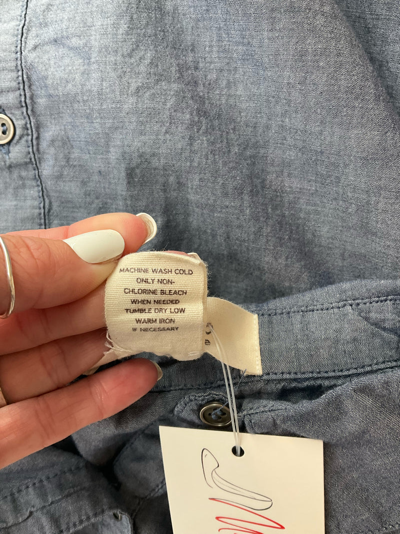 Care label of Workshop Blue Solid Pre-Owned Ladies Top - Size Small. Instructions include machine wash cold and tumble dry low.
