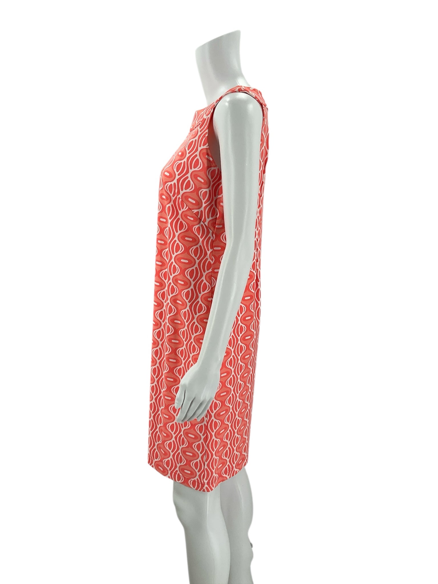 Side profile of Katherine Way Coral/White Print Dress - Size Small highlighting its tailored fit and vibrant coral and white print.
