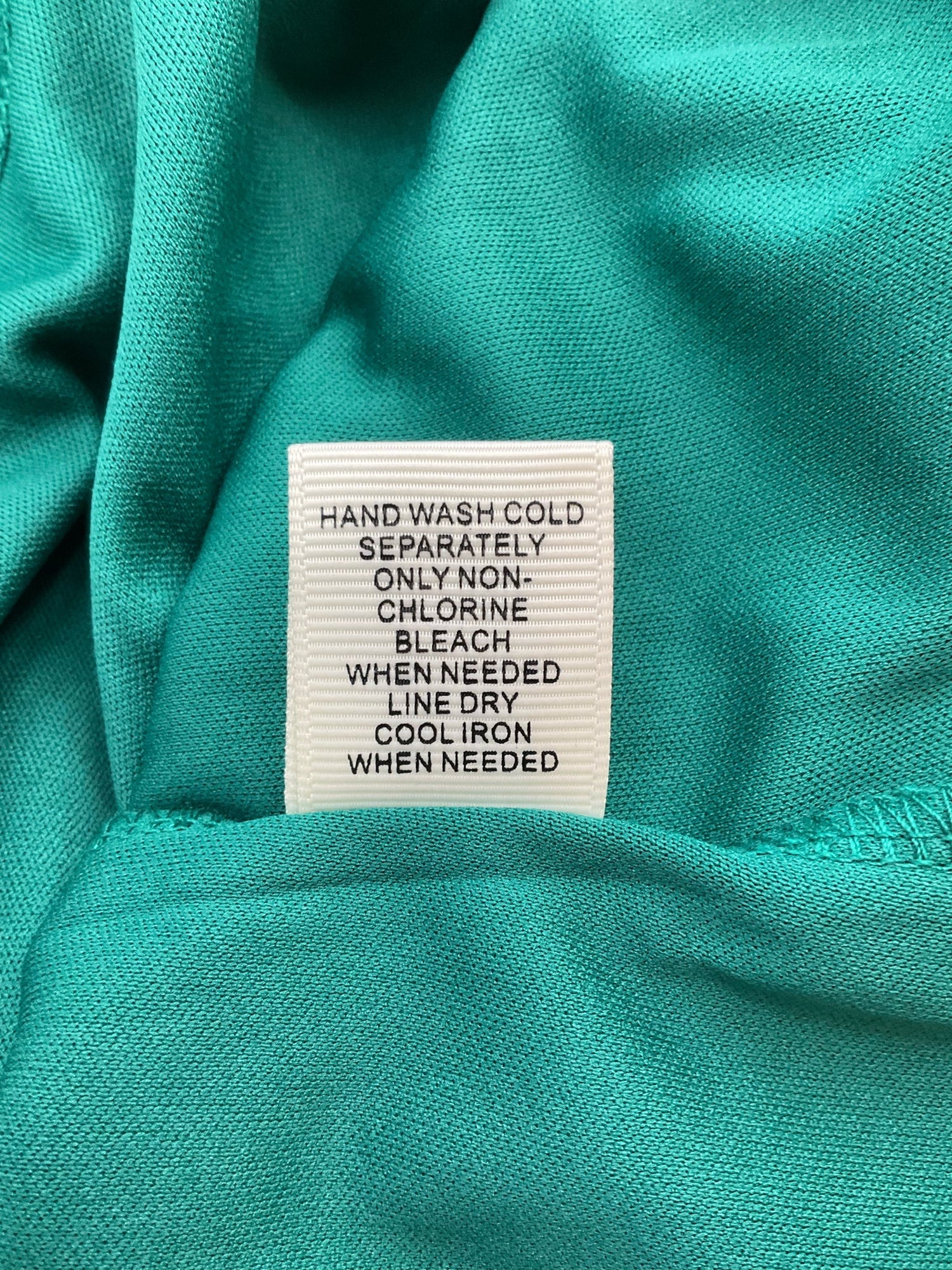 Ultra Pink boho ladies tunic top in pink and green lace, featuring bell sleeves, size medium.