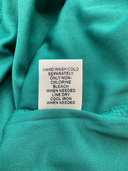 Ultra Pink boho ladies tunic top in pink and green lace, featuring bell sleeves, size medium.