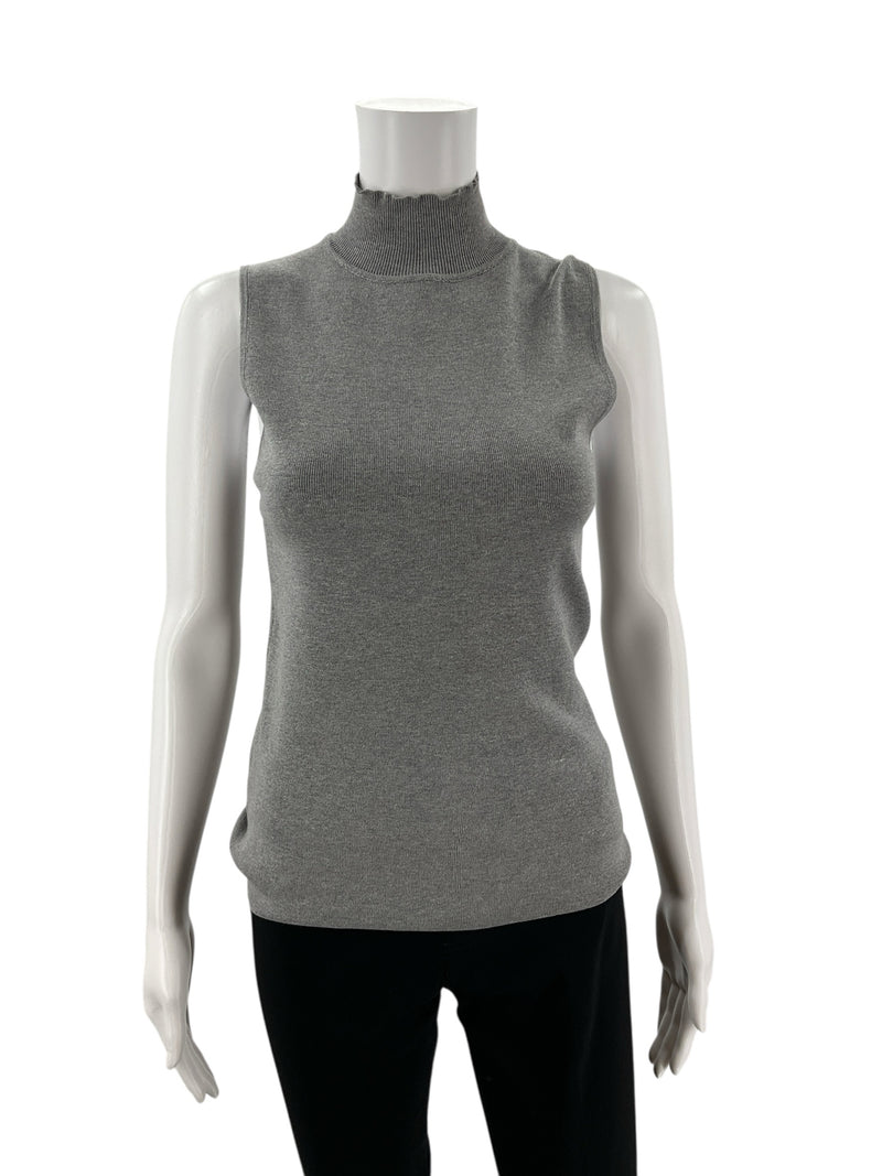 Front view of Chico's gray mock neck sleeveless sweater shell in size small, featuring a fitted silhouette and soft knit texture.