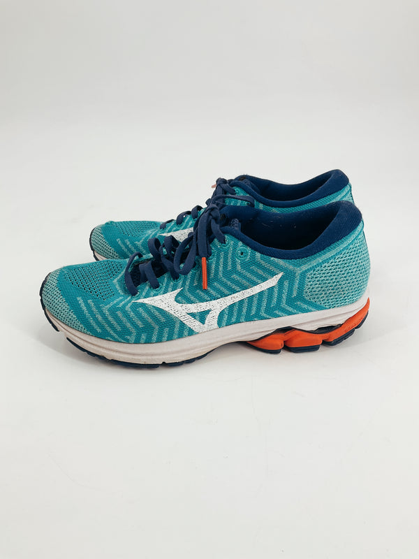 Mizuno Teal Logo Pre-Owned Ladies Sneakers - Size 8 with white logo and orange sole accent, side view for casual athletic wear.