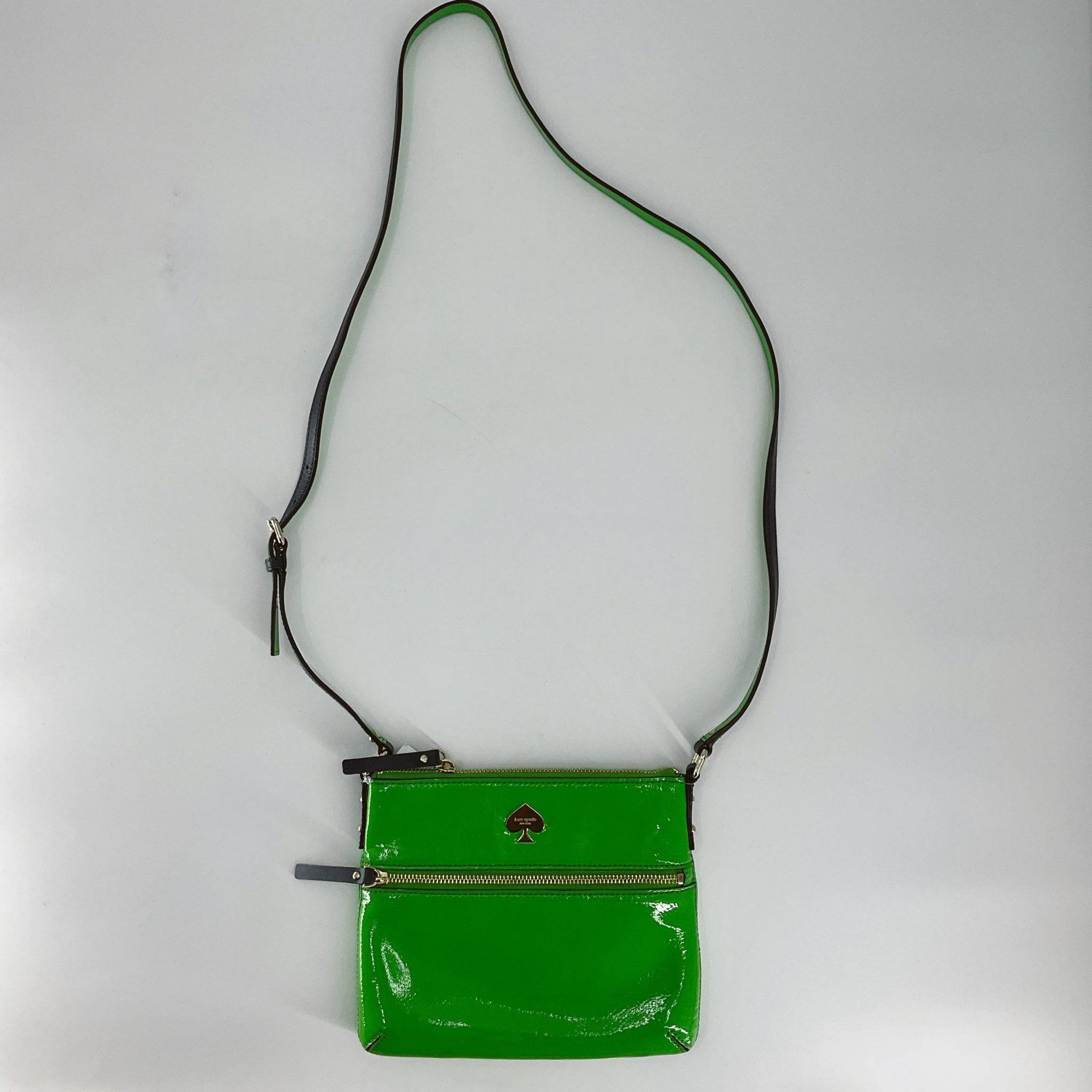 Kate Spade Lime Green Solid Pre-Owned Crossbody Bag with patent leather finish, gold-tone zipper, and adjustable strap, available at Margaret's.