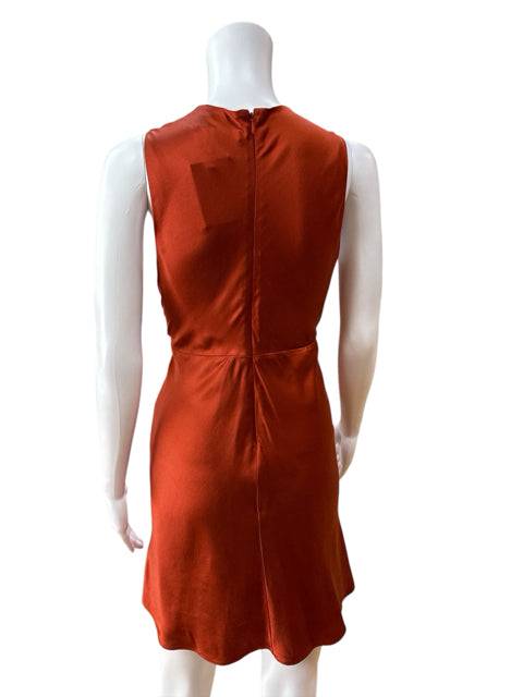 Back view of Banana Republic Sleeveless Mini Dress Size 6P in rust silk, displaying the zipper closure and tailored fit.