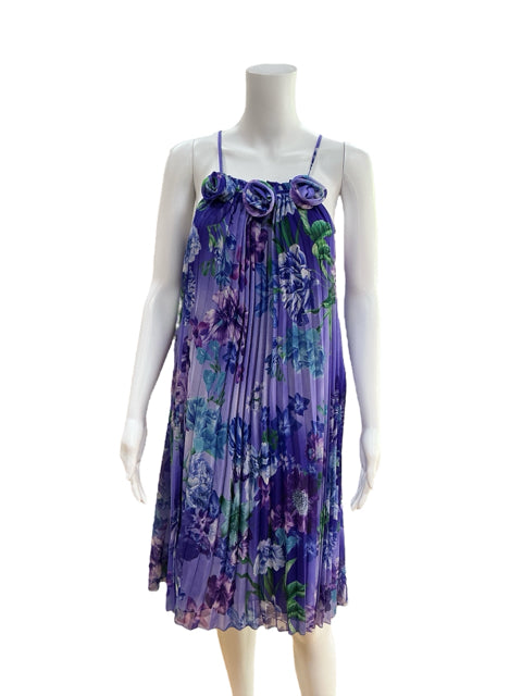 Front view of Argenti Purple Floral Rosette Pleated Halter Dress on mannequin, showcasing pleated chiffon and floral print for formal occasions.