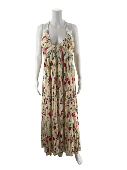 H&amp;M cream floral maxi dress with halter neck, pleated skirt, empire waist, and open back in size large.