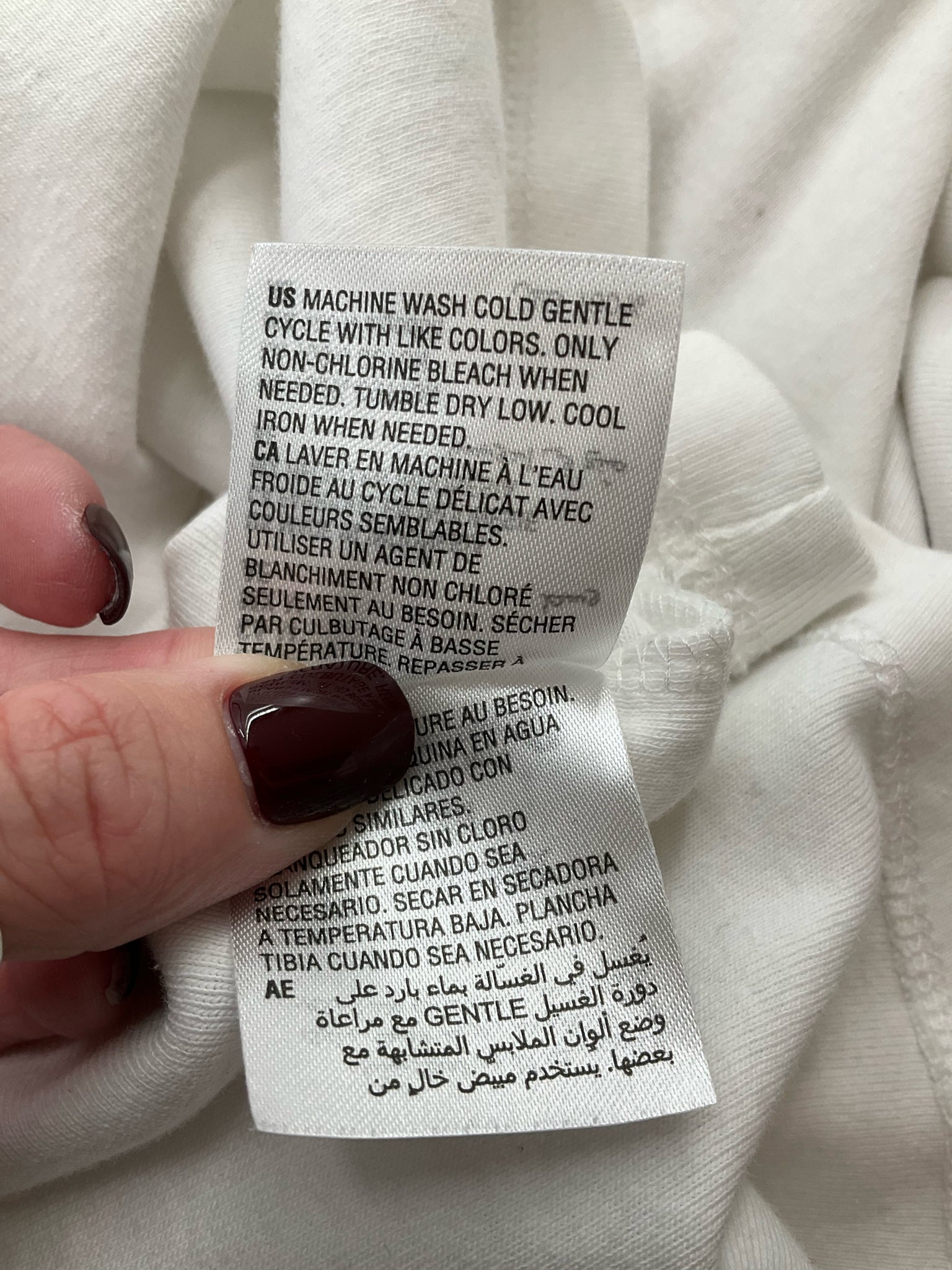 White solid A-line top for women by Karen Scott in size medium, featuring a minimalist, casual design.