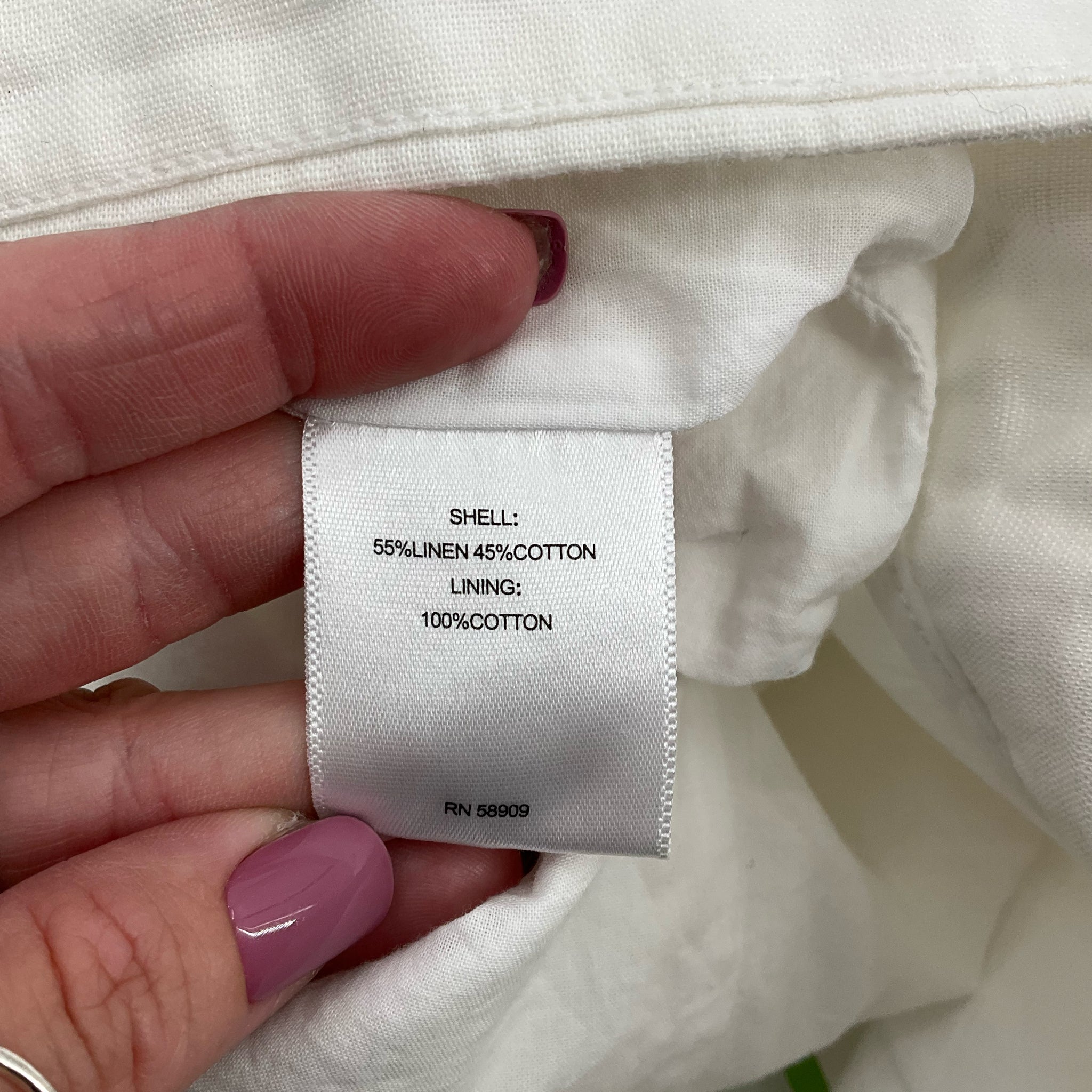 High-waisted, cuffed white shorts by a loves a, featuring pleats, ideal for casual or resort wear. Size 2.