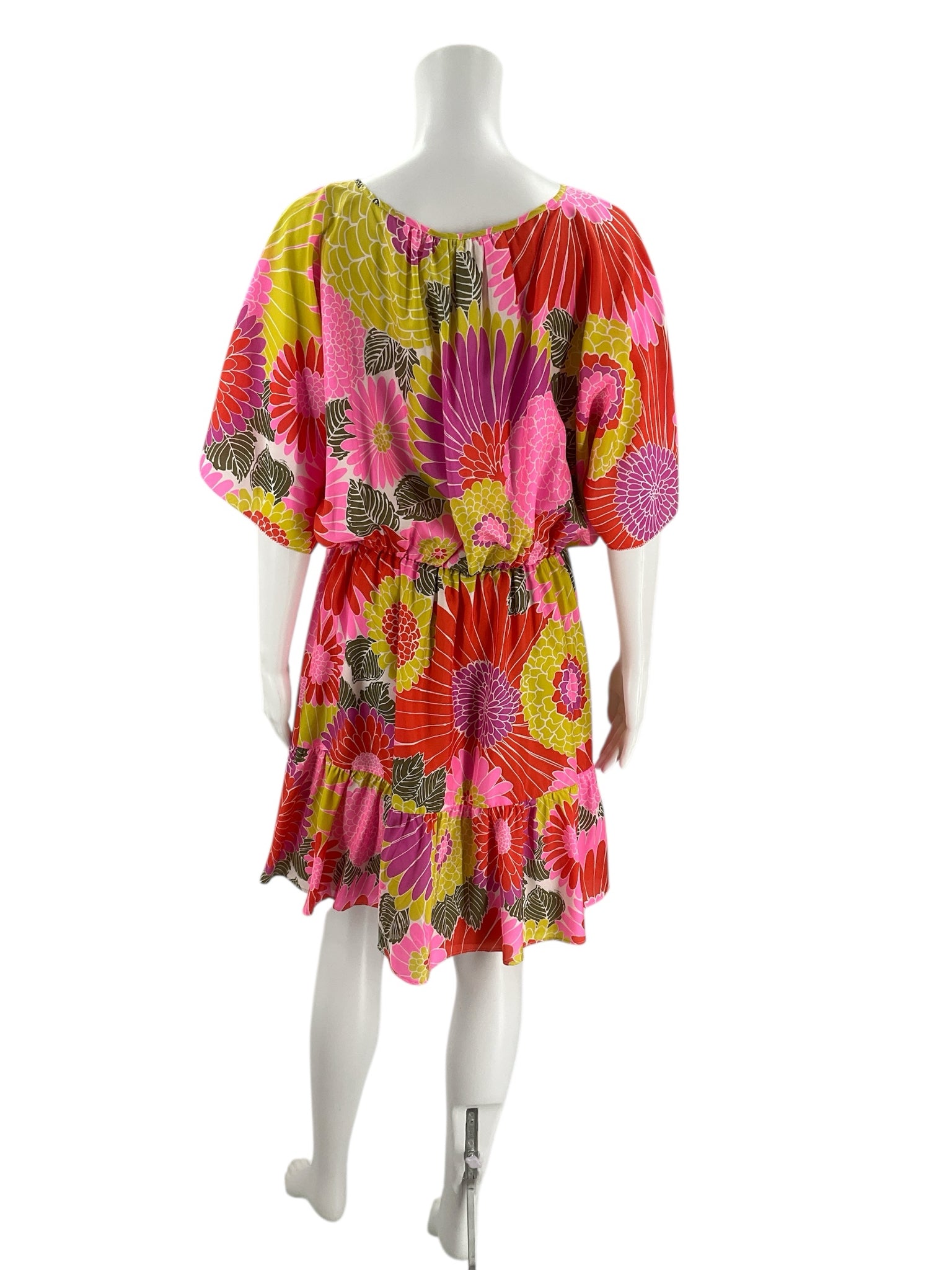 Back view of Trina Turk Orange/Green/Purple Floral Dress - Size Large, showcasing colorful floral pattern and relaxed fit, pre-owned.