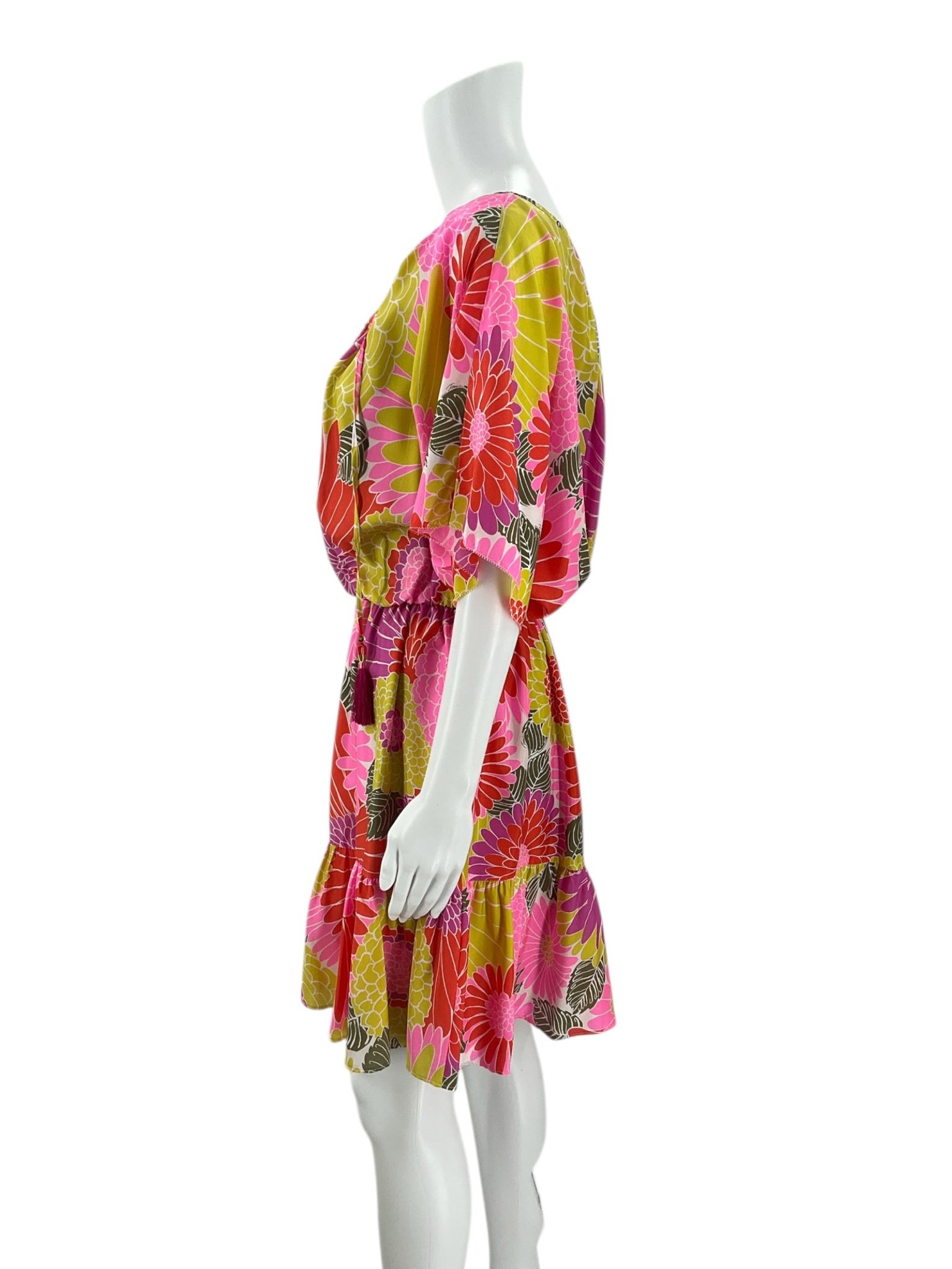 Side profile of Trina Turk Orange/Green/Purple Floral Dress - Size Large, highlighting flowy silhouette and tiered skirt design.