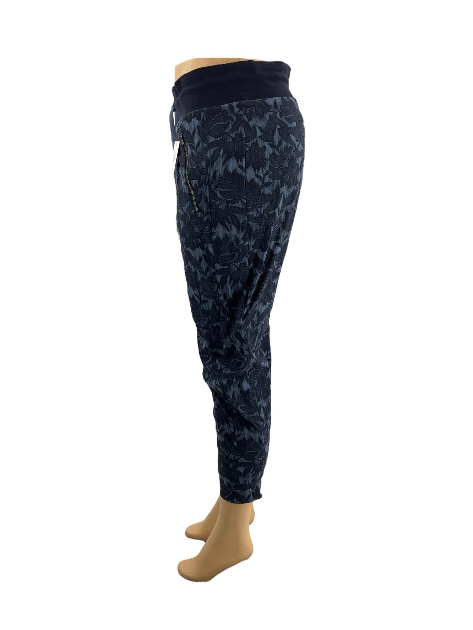 Athleta blue floral activewear for women, size 6, showcasing vibrant patterns and comfortable design.
