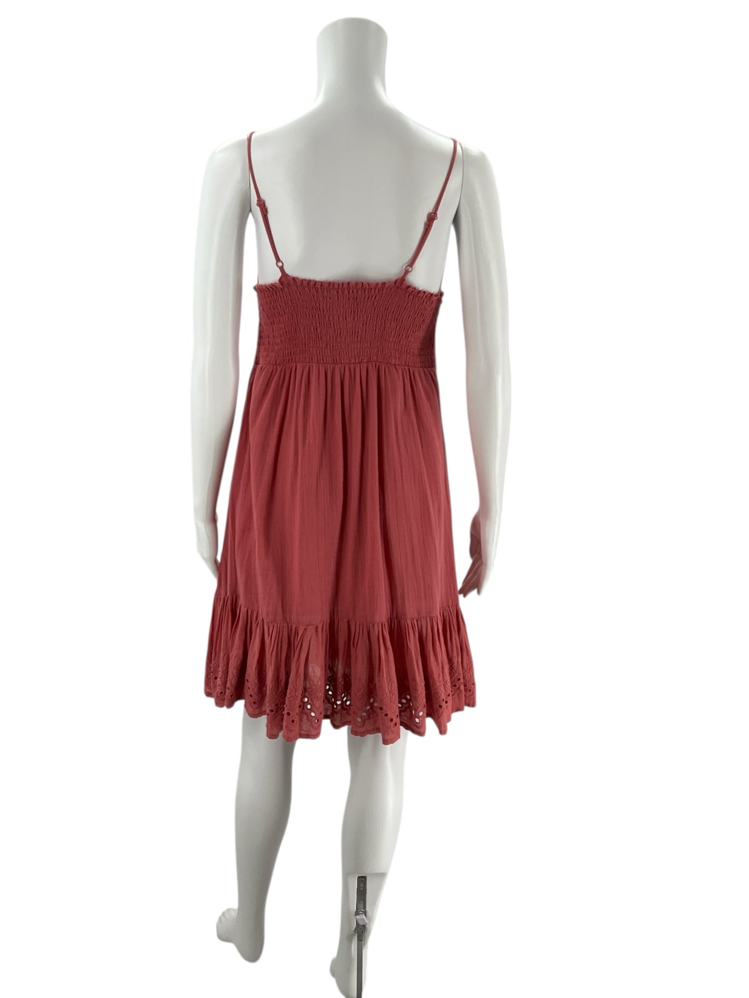 Back view of House of Harlow Salmon Eyelet Dress - Size XS featuring smocked bodice and adjustable straps, gently used and perfect for warm weather