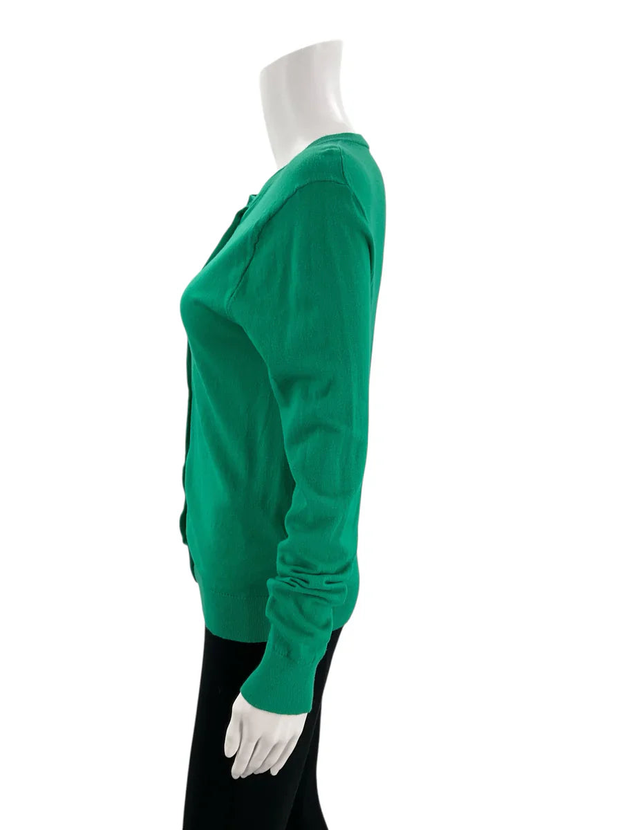 J Crew green solid pre-owned ladies top in size medium displayed on a hanger with a neutral background.