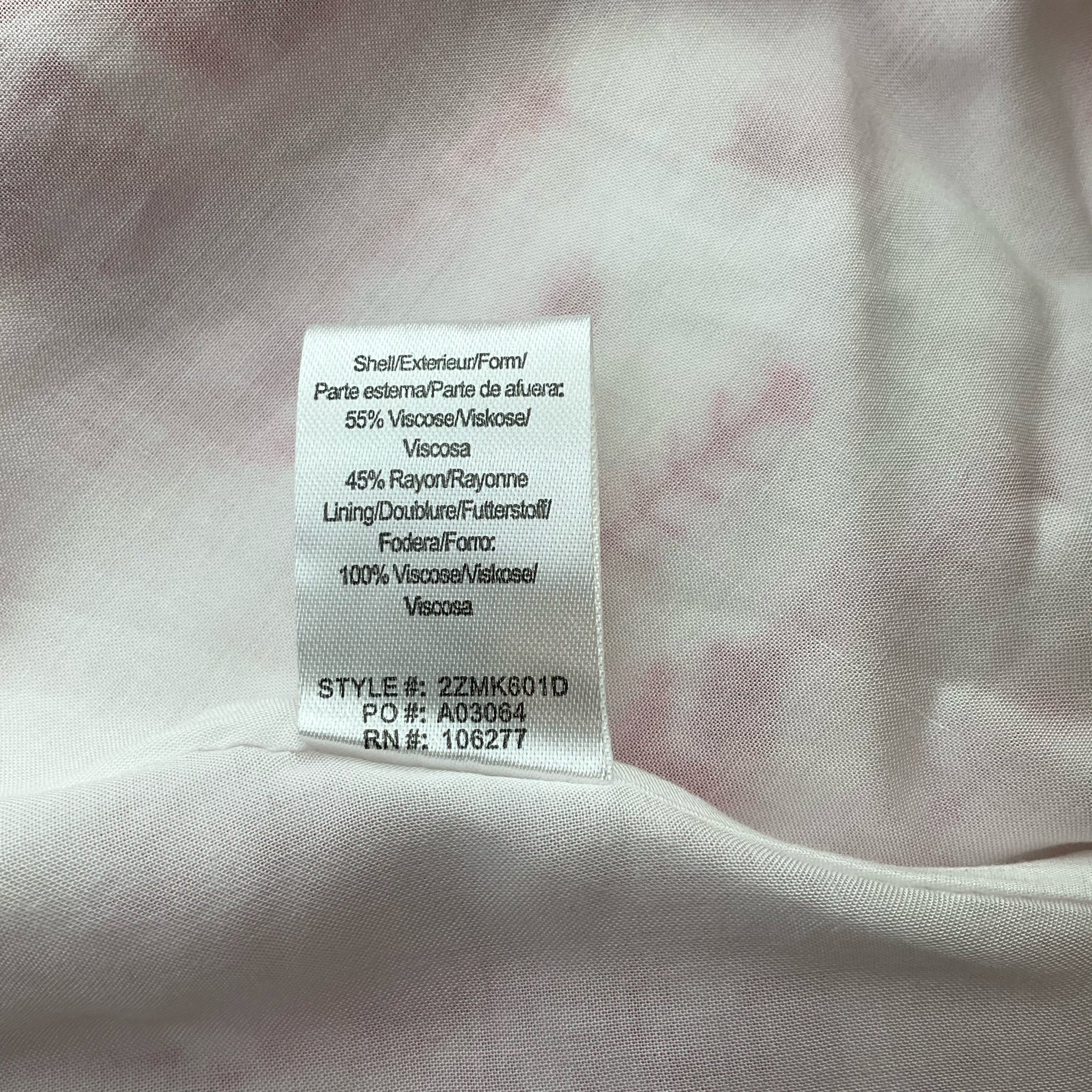 Fabric content tag of Hale Bob White/Pink Print Dress - Size Large showing 55% viscose and 45% rayon shell with 100% viscose lining.