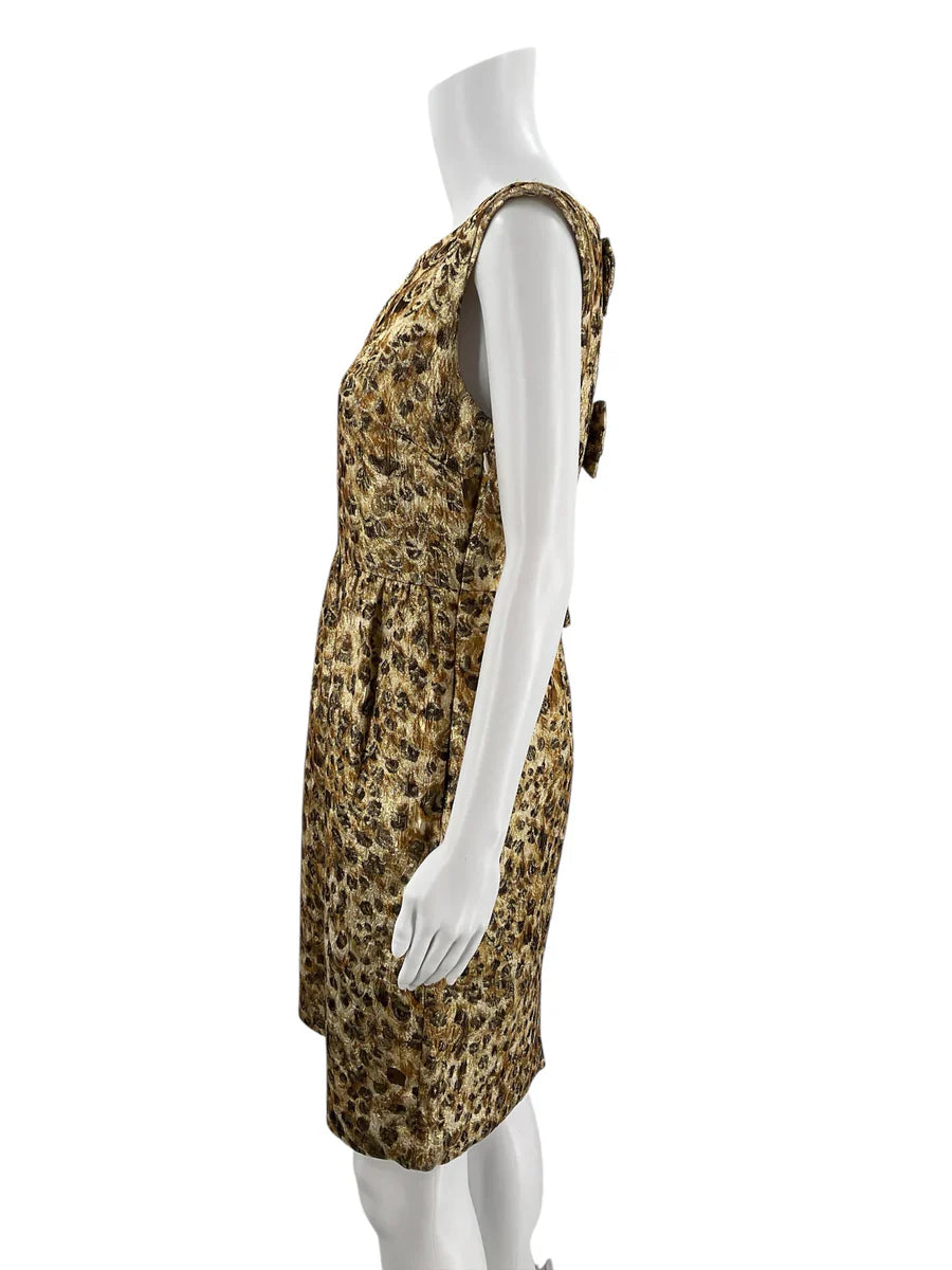J Crew gold animal print ladies dress in size 4, featuring a stylish design and vibrant colors.