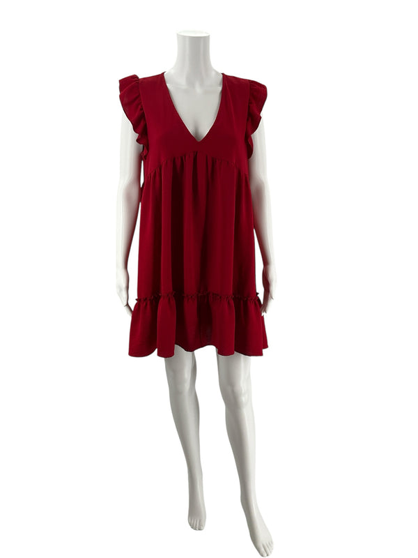 Front view of Altar'd State red babydoll mini dress on mannequin, featuring v-neckline, ruffle cap sleeves, and tiered hem, size large.