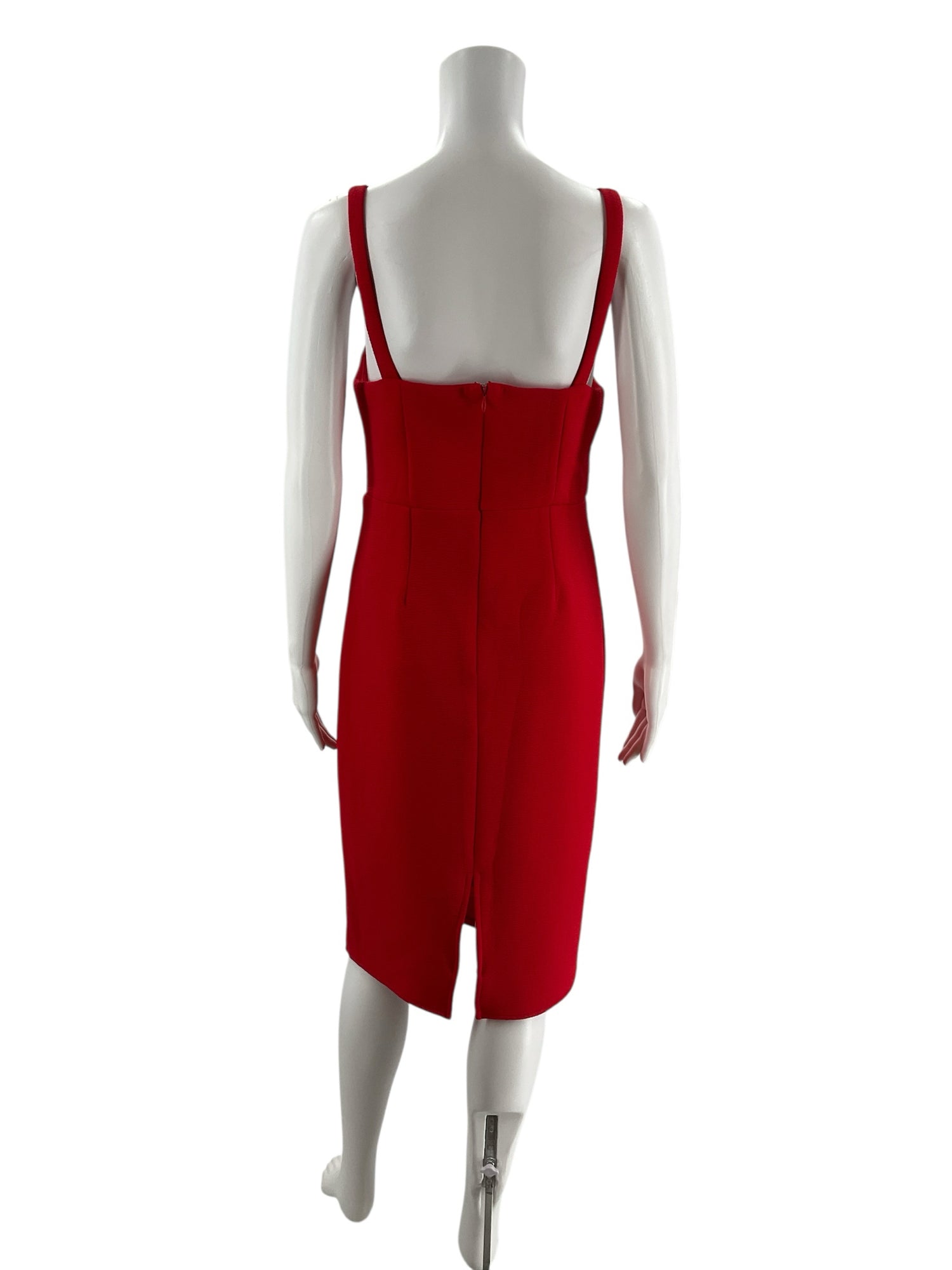 Back view of Lulus Remarkable Presence red sheath dress in size large, showing zipper closure and back slit detail for added comfort and style.