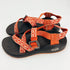 Chaco Orange Pre-Owned Ladies Sandals - Size 6 with woven geometric straps, black footbed, and adjustable toe loop for hiking and water use.