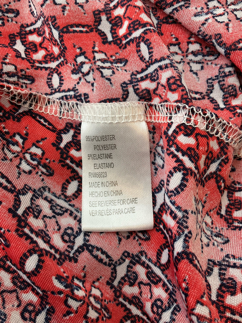 Fabric content tag of Western Connection dress showing 95% polyester and 5% elastane blend, ensuring stretch and comfort in size L midi dress.