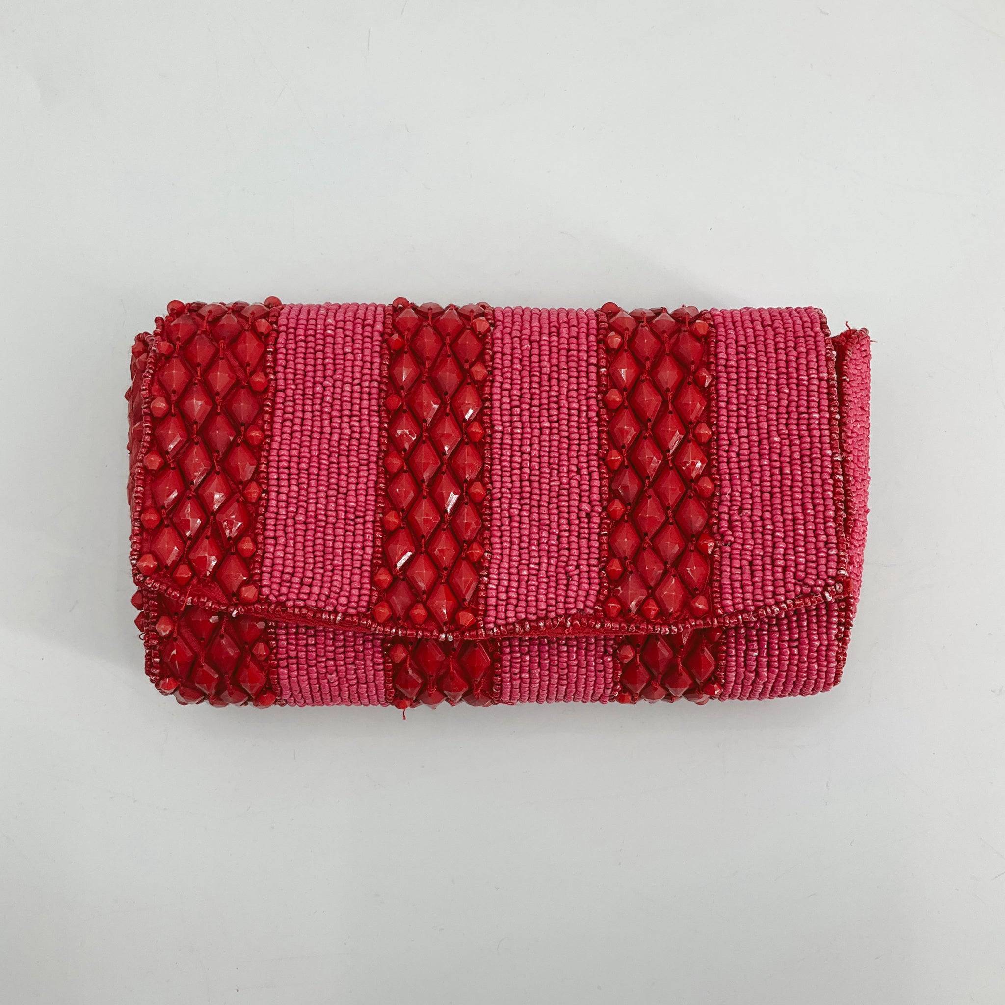 Anthropologie Red Beaded Pre-Owned Clutch with striped beadwork in red and pink tones, available at Margaret's Fine Consignments. Ideal for evening wear.