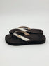 Brown and cream Reef flip flop sandals for ladies, size 7, featuring a casual thong design ideal for beachwear.