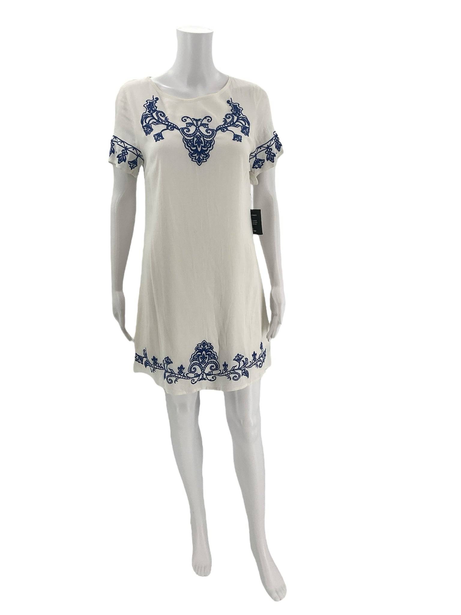 Front view of Lulus white and blue embroidered mini dress size small, new with tags, available at Margaret’s Fine Consignments.