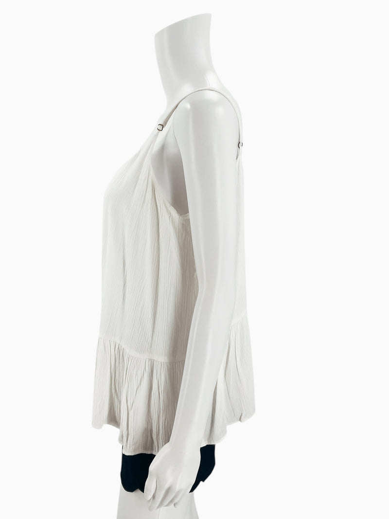 Side profile of Lilly Pulitzer white casual top in size large, showcasing adjustable straps and flowy silhouette. Perfect for warm-weather outfits.