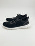 Cole Haan Black Pre-Owned Ladies Sneakers Size 8 with white soles and mesh upper, ideal for casual wear or light workouts.