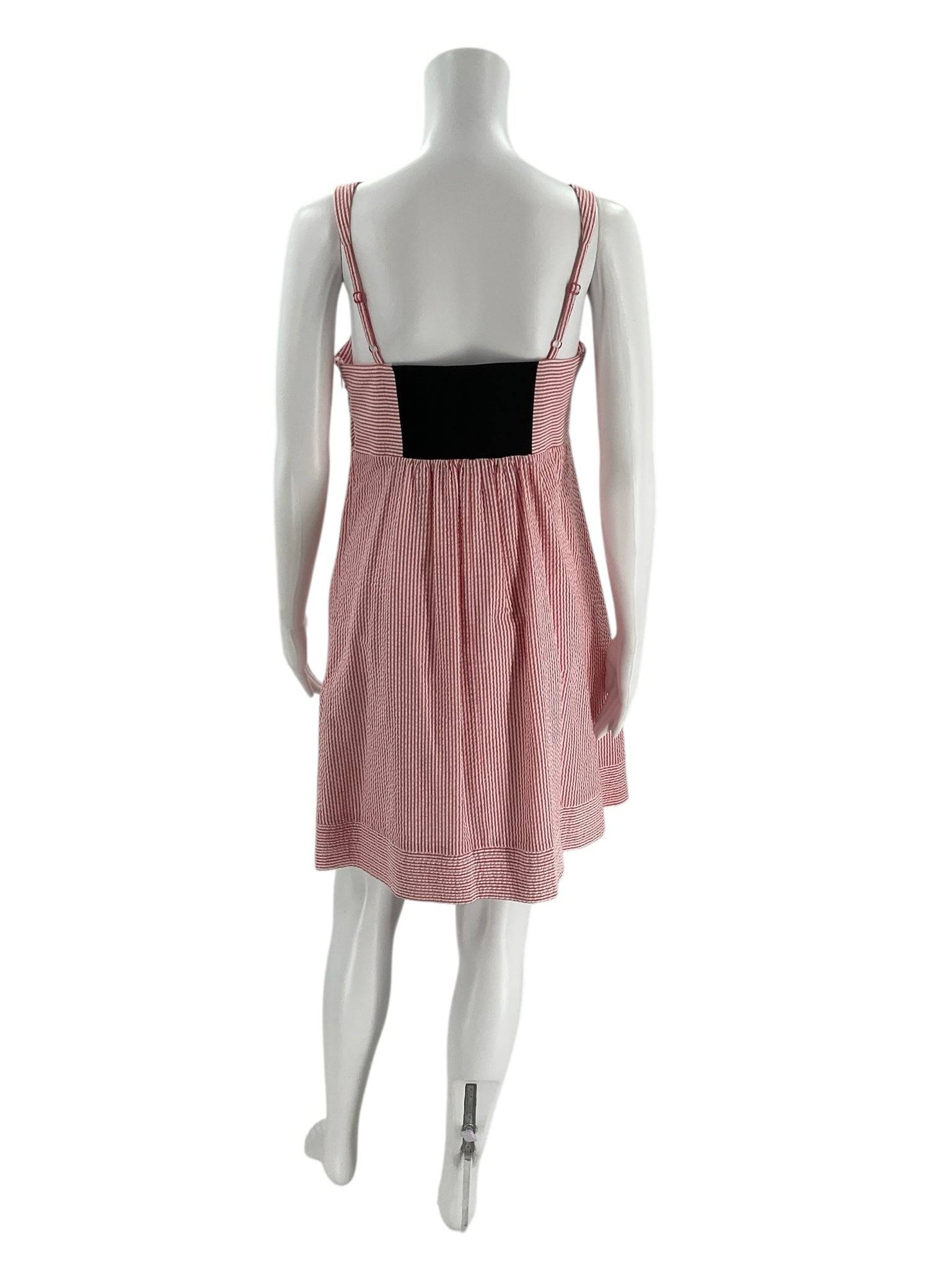 Back view of Jessica Simpson square neck mini dress size 6 in red and white stripes, featuring black stretch panel and adjustable straps.