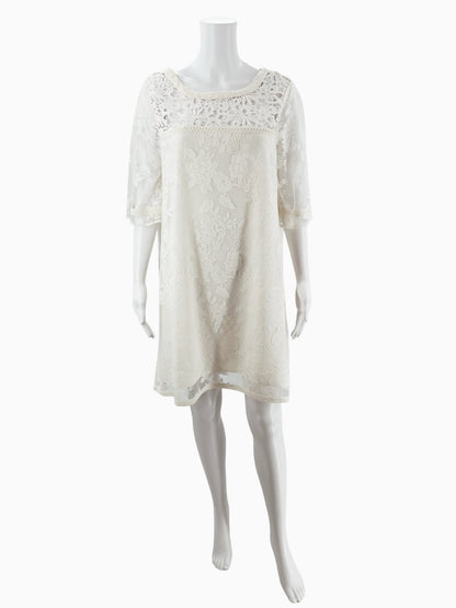 Front view of Catherine Cream Floral Pre-Owned Ladies Dress on mannequin, featuring shift silhouette and intricate lace detailing.
