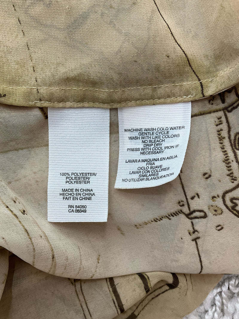 Fabric care label of Rachel Roy Tan Pre-Owned Ladies Top - Size Small indicating 100% polyester and washing instructions.