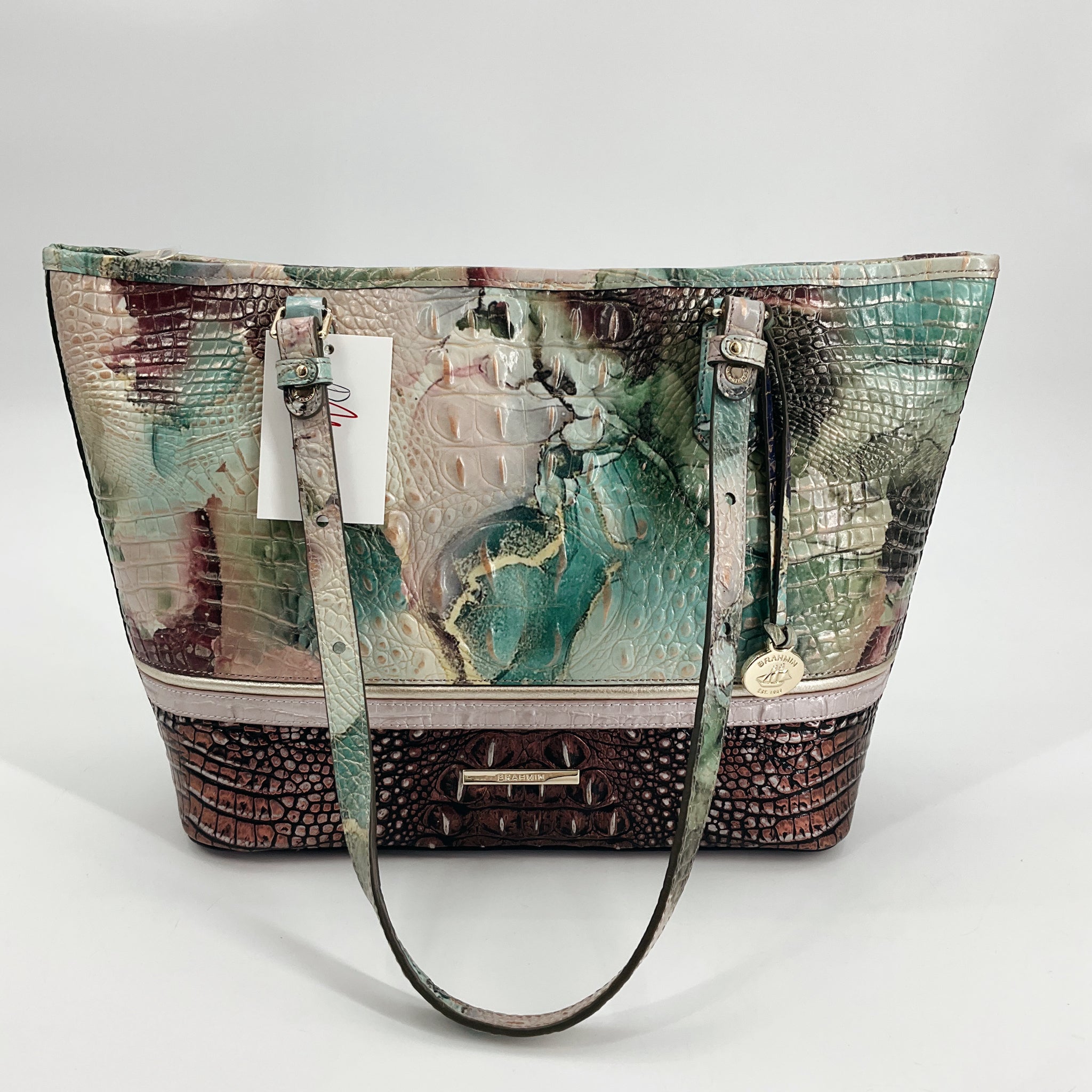 Brahmin Green/Purple Crocodile Medium Tote with dual handles and embossed leather, available pre-owned at Margaret's Fine Consignments. Features multicolor crocodile texture and gold-tone hardware.