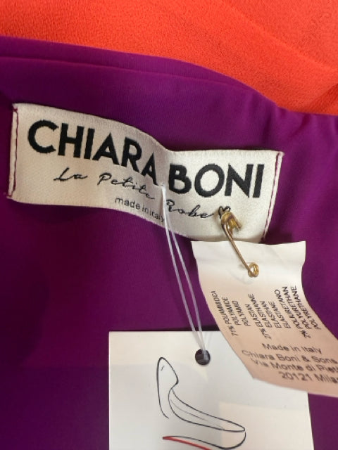 Chiara Boni La Petite Robe designer label sewn into the fuchsia dress, indicating Italian craftsmanship and authenticity.