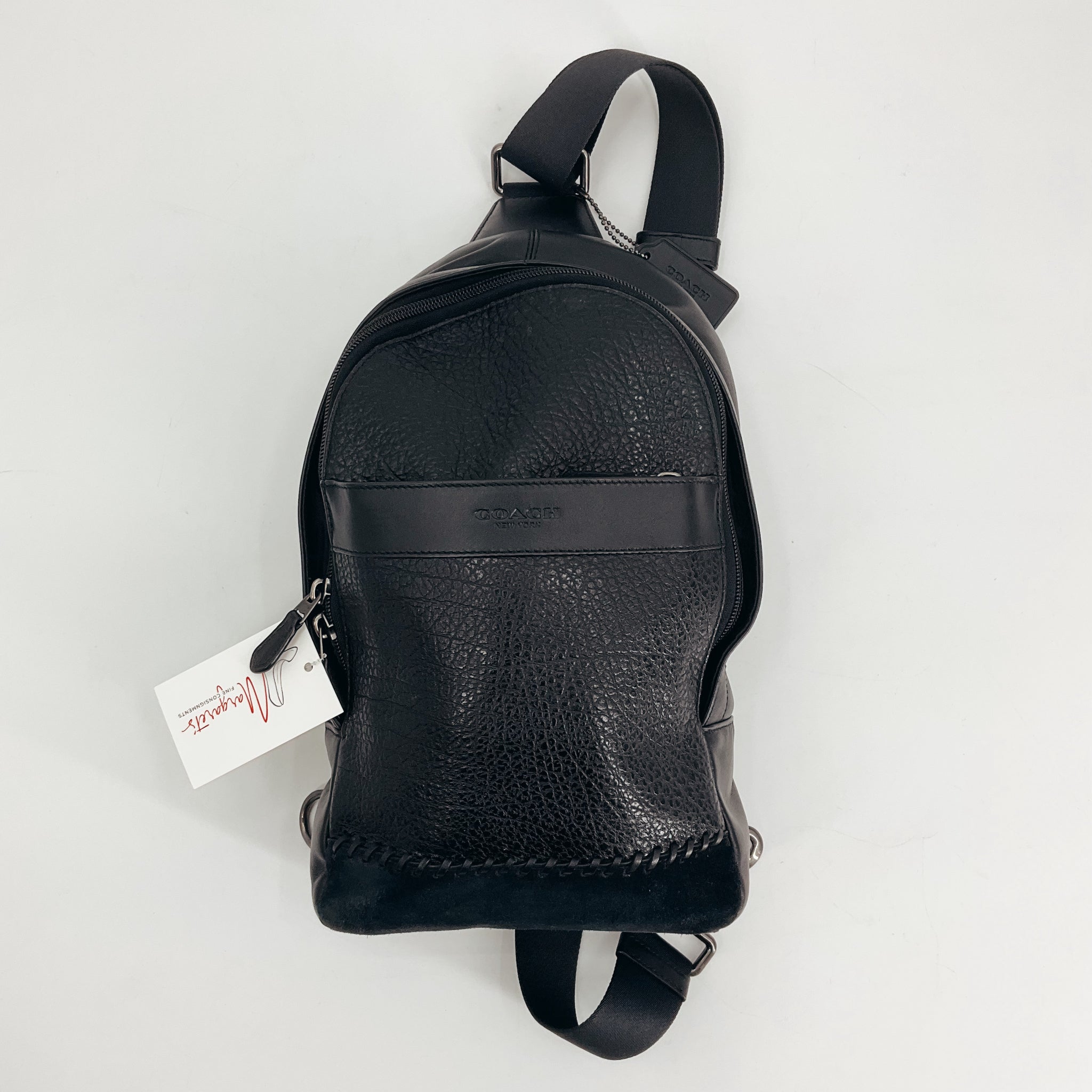 Coach Black Solid Backpack | Gently Used, Pre-Owned with textured leather finish, front zip pocket, and adjustable straps, ideal for daily use or travel.