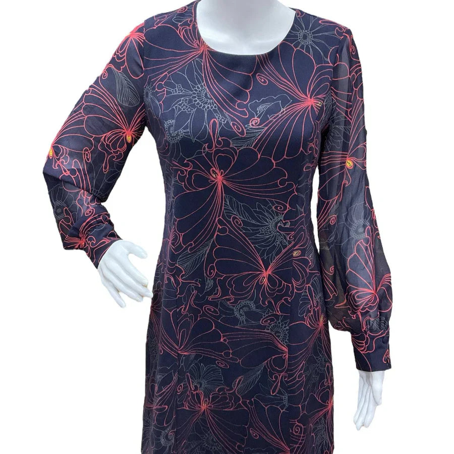 Navy Julie Brown ladies dress with butterfly print, size 4, showcasing vibrant colors and a stylish design.