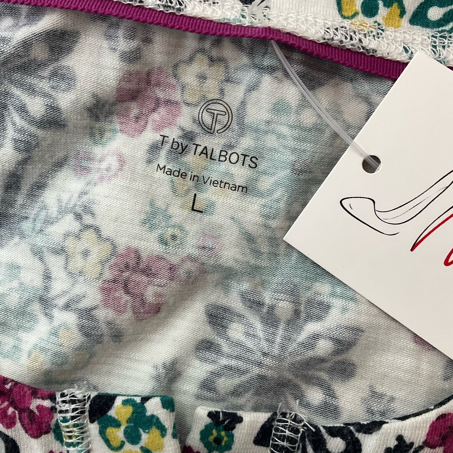 Talbots white and multi floral casual top for ladies in size large, featuring a vibrant floral pattern on a light background.