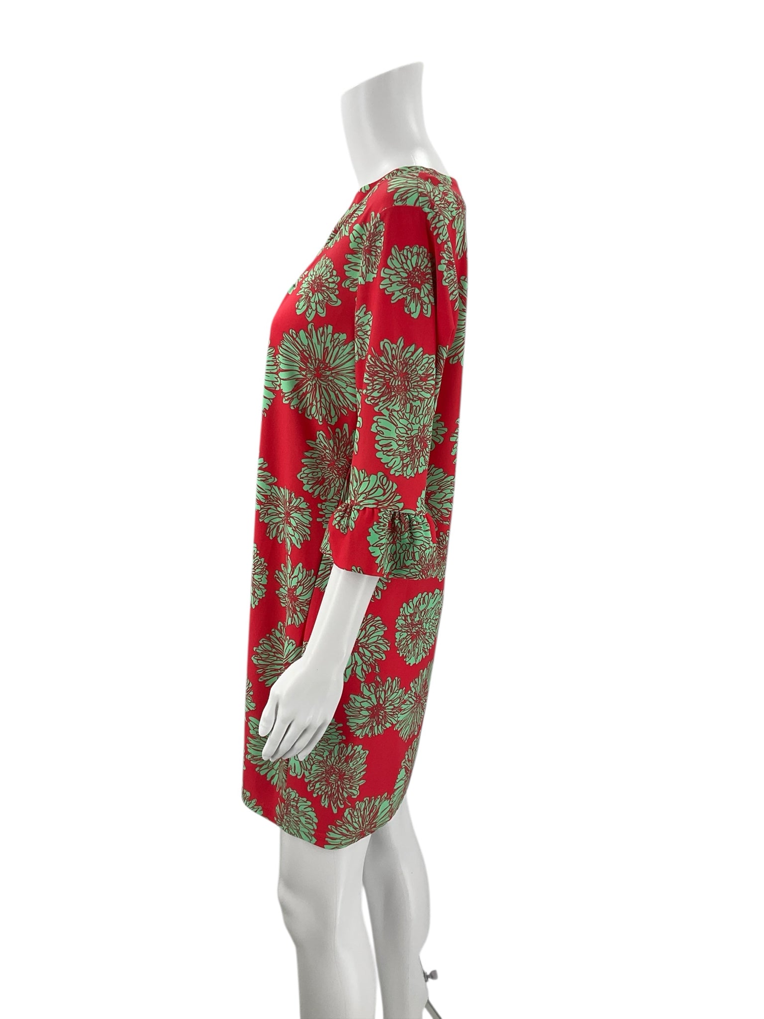 Side profile of Aryeh Coral/Green Print Dress - Size Large highlighting the shift silhouette and lightweight fabric.
