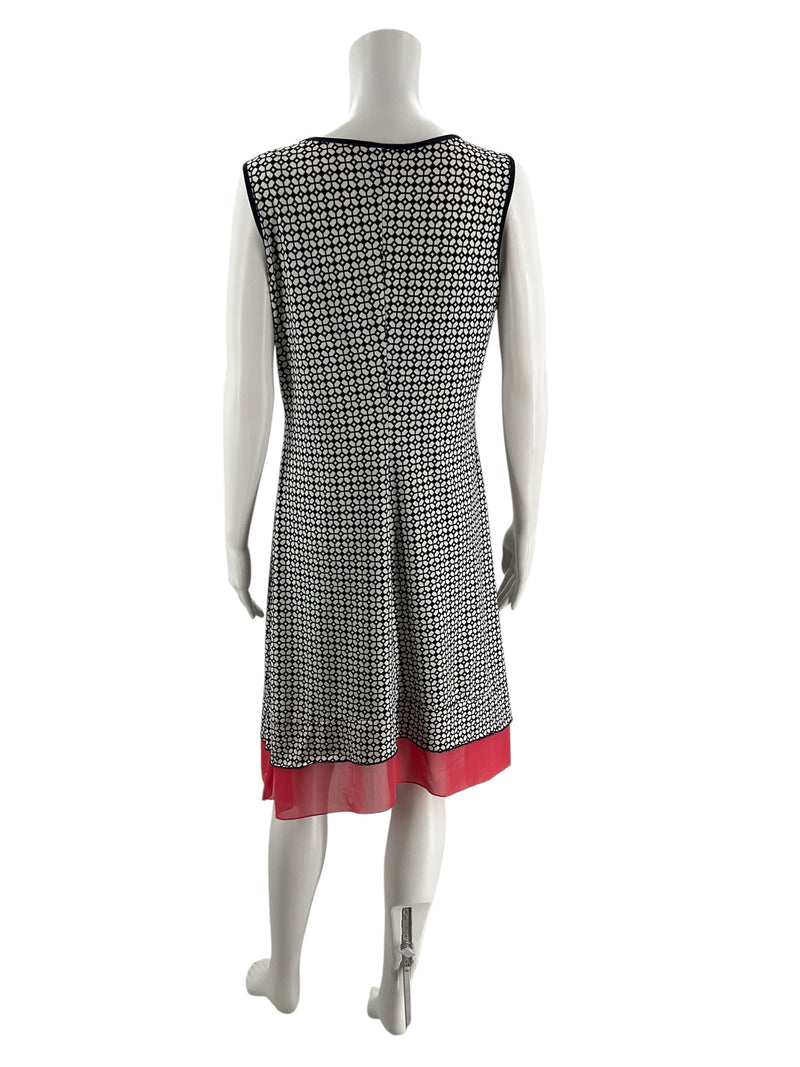 Back view of Perception Concept Navy/White Print Pre-Owned Ladies Dress - Size Medium with navy and white mosaic print and coral layered hem.