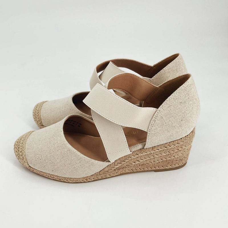 Dream Pairs tan espadrilles sandals size 8 with crisscross elastic straps and woven wedge heel, available at Margaret’s Fine Consignments.