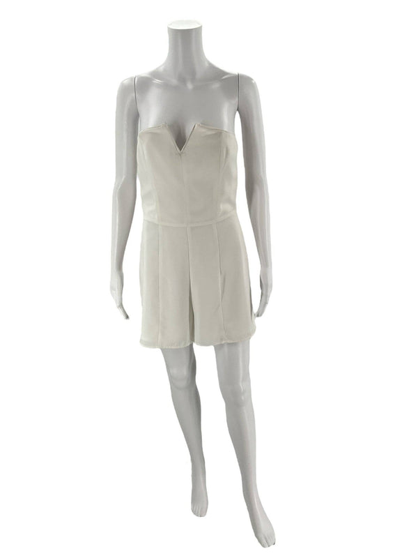 Leith Romper Size Medium in solid white with strapless sweetheart neckline, available at Margaret’s Fine Consignments. Minimalist chic for modern wardrobes.