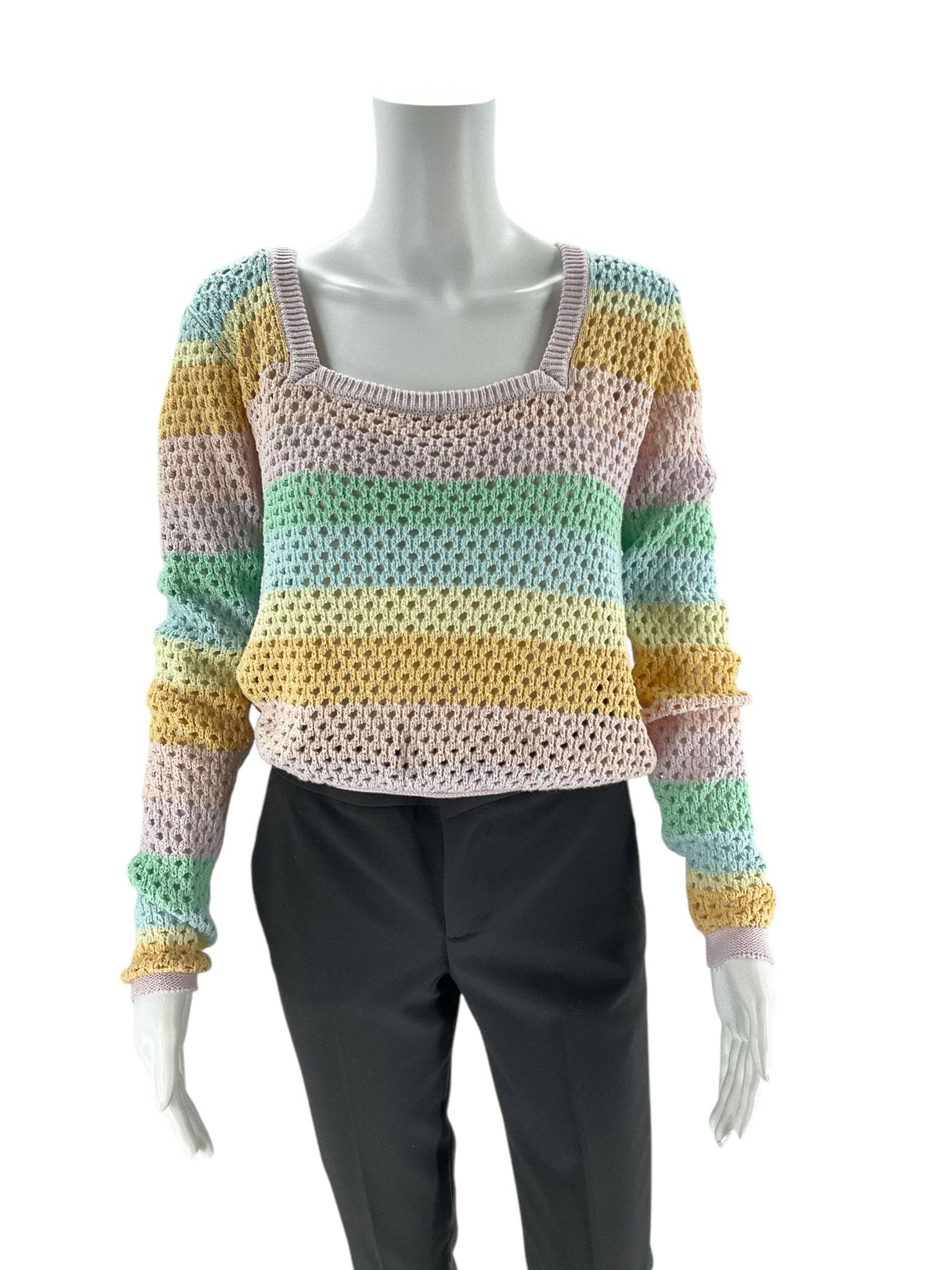 Pink Lily square neck long sleeve rainbow sweater in size small, styled on mannequin with black pants. Available at Margaret’s Fine Consignments.