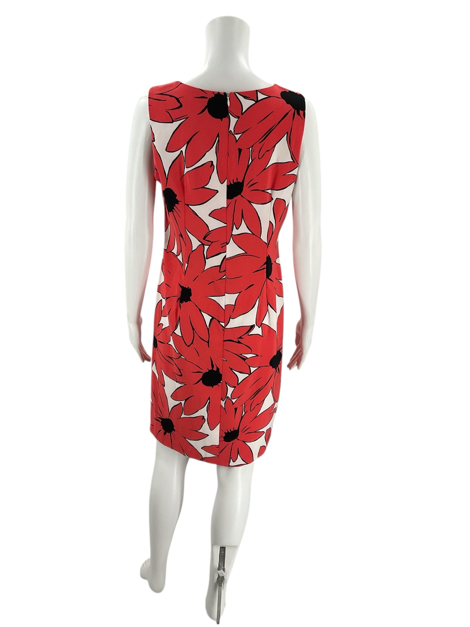 Back view of Ronni Nicole White/Coral Floral Dress - Size 8 showing zipper closure and vibrant floral pattern, pre-owned at Margaret’s.