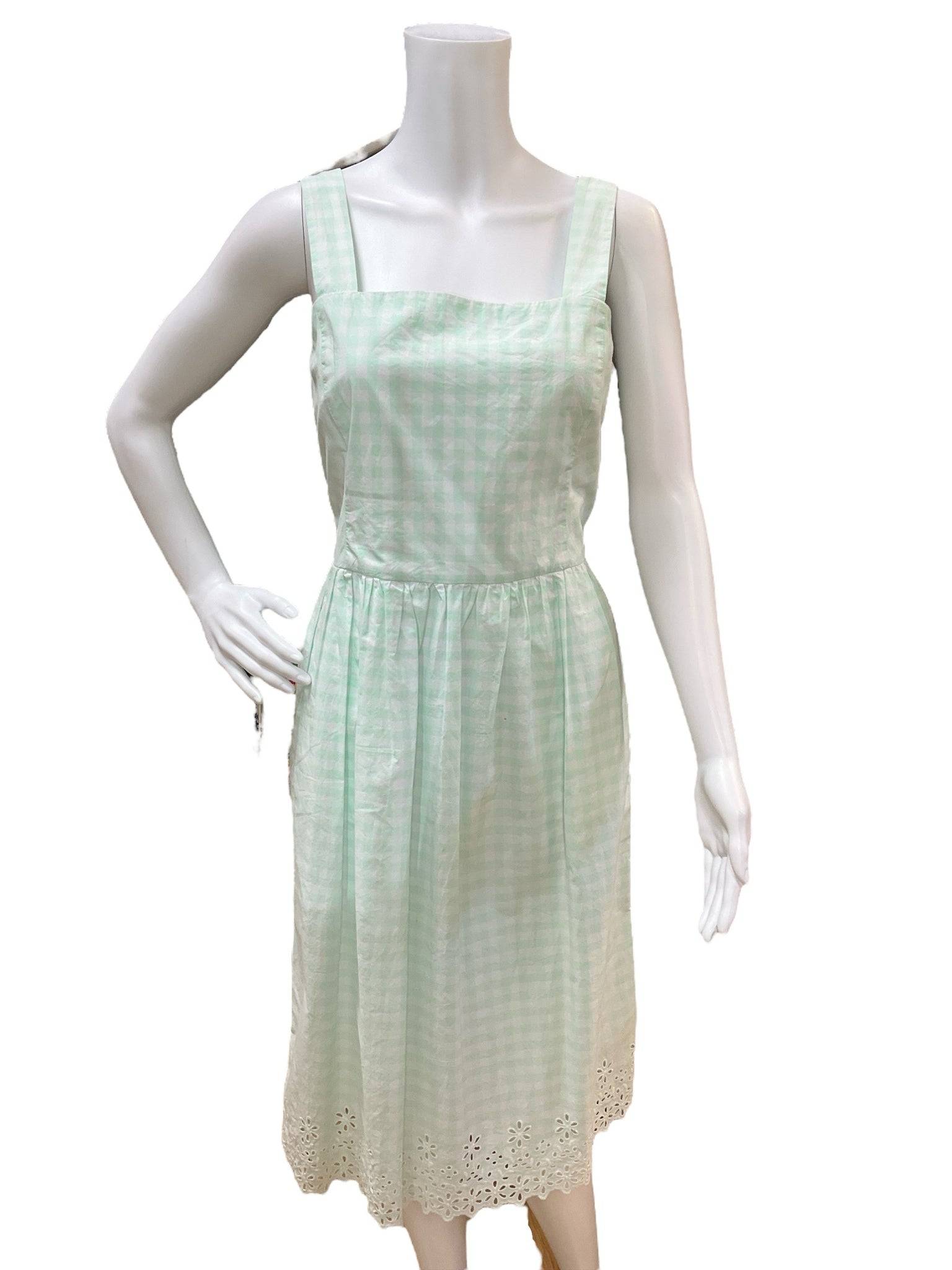 Front view of Draper James white/mint checkered sleeveless dress, size 6, featuring a square neckline and gathered waist, ideal for casual wear.