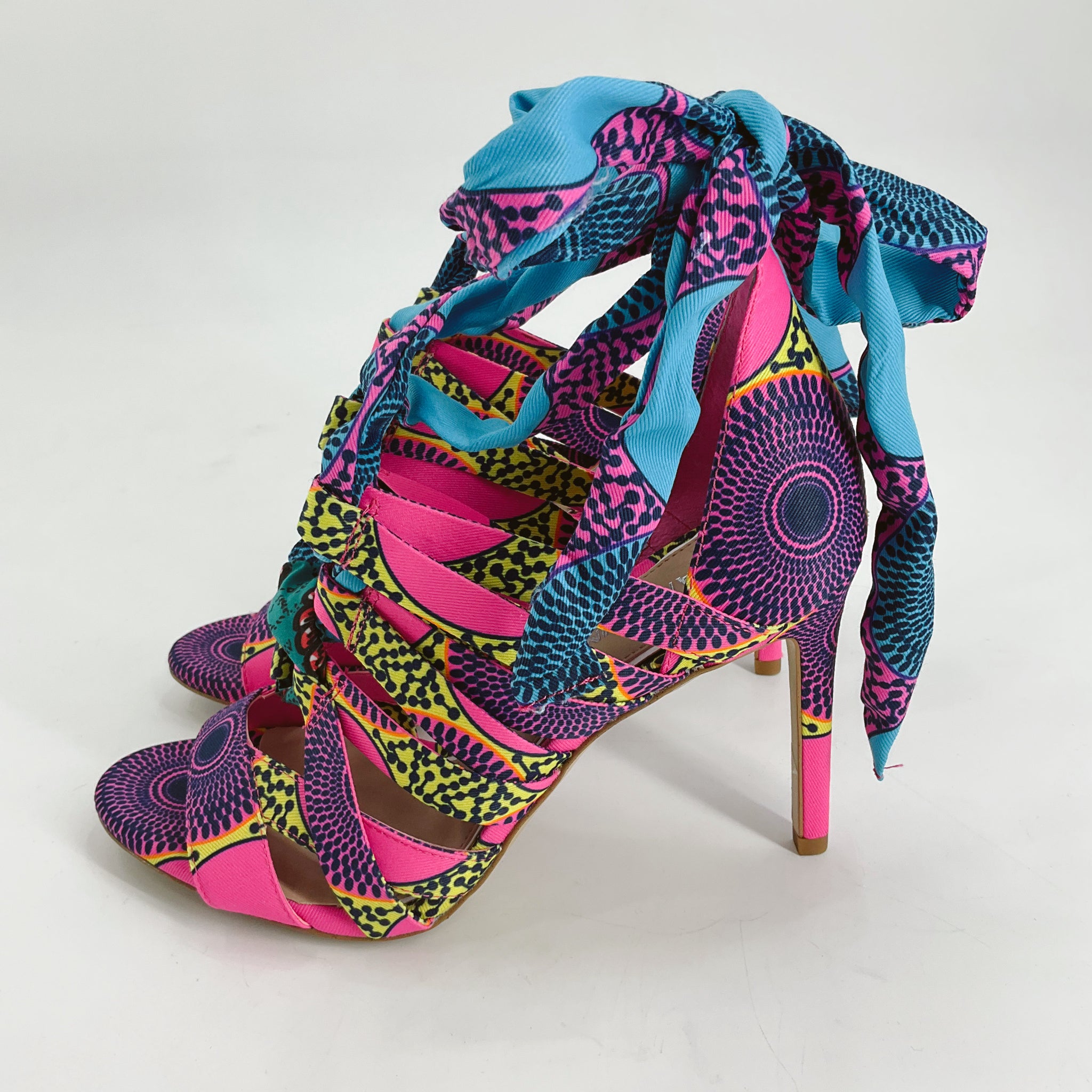 Gianni Bini Pink/Multi Print Heel - Size 8 with bold tribal-inspired patterns, strappy design, and ankle wrap ribbons in blue and pink tones.