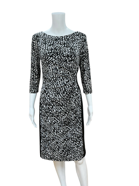 Front view of Ralph Lauren Black/White Animal Print Sheath Dress, size 8, featuring color-block side panels and knee-length jersey fabric.