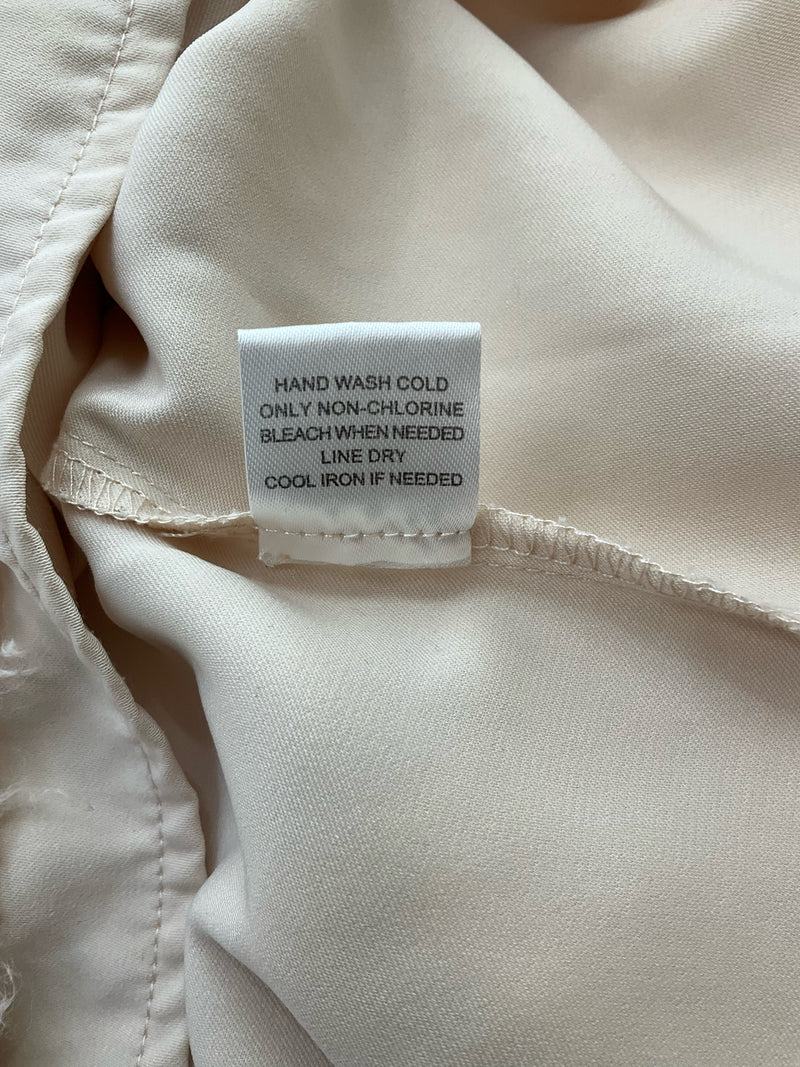 Care label of 41 Hawthorn Beige Lace Pre-Owned Ladies Top - Size XS, with hand wash instructions and fabric care recommendations.