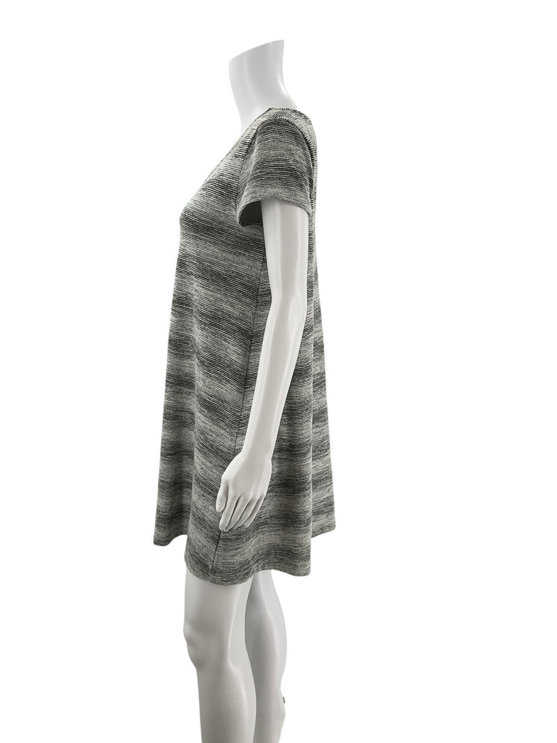 Side profile of Mossimo gray heathered A-line swing dress on mannequin, highlighting flowy casual fit and soft poly-cotton blend fabric.