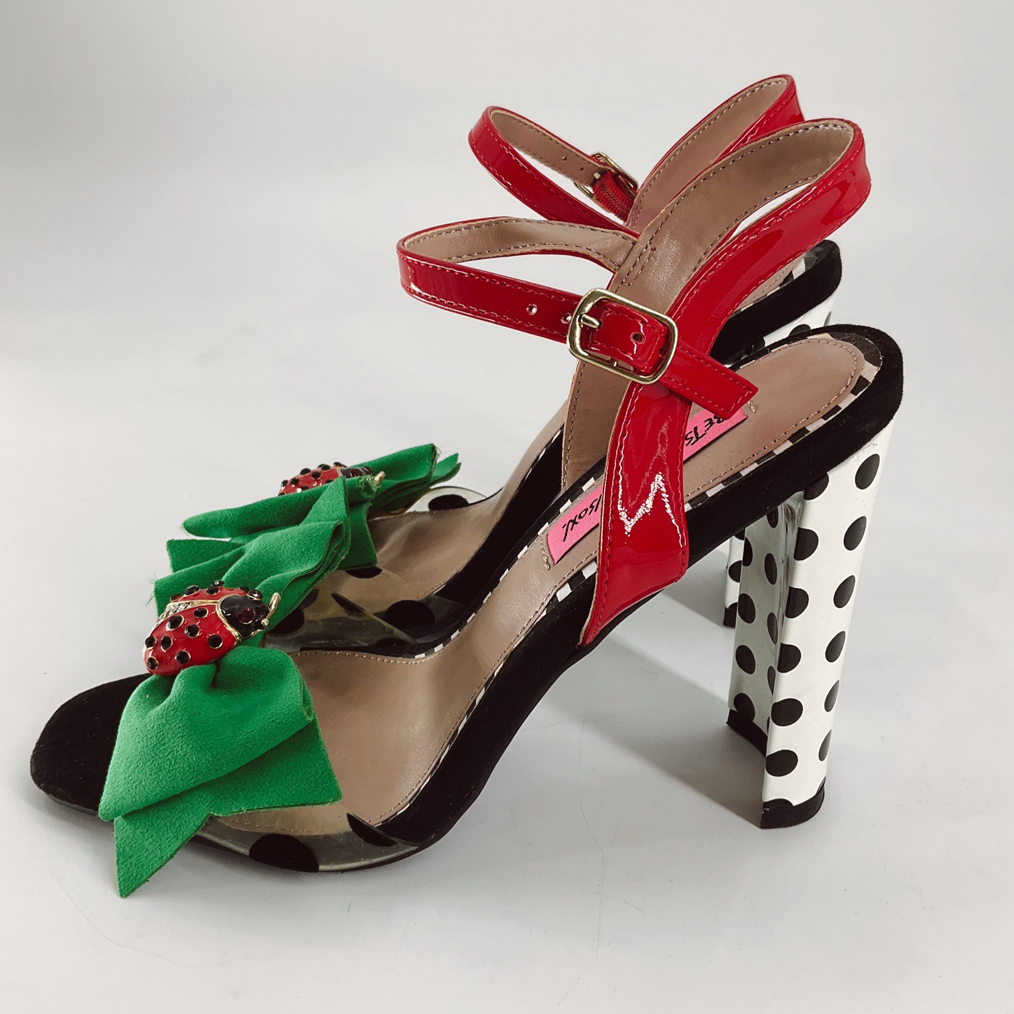 Betsey Johnson Black/White Ladybugs Heel - Size 7.5 features red ankle straps, polka dot heel, and green bows with ladybug embellishments.