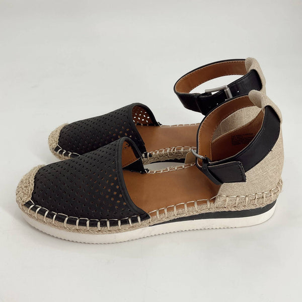Ana Sandals Size 7 from Margaret’s Fine Consignments featuring black perforated uppers, natural woven toe caps, and ankle straps in side view.